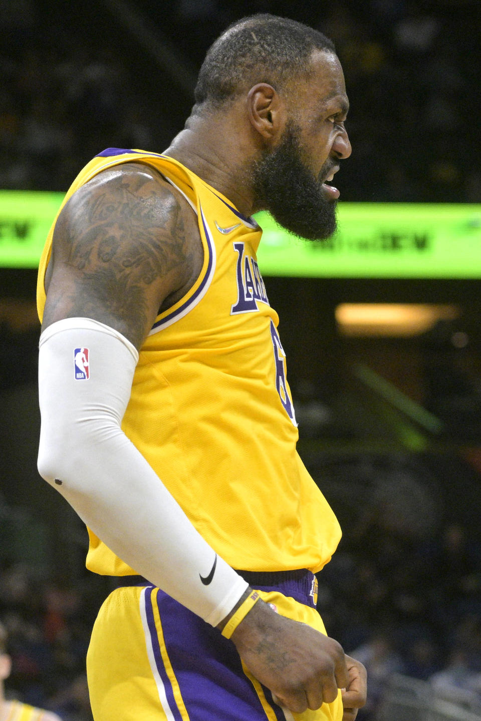 Los Angeles Lakers forward LeBron James (6) reacts after scoring during the first half of an NBA basketball game against the Orlando Magic, Friday, Jan. 21, 2022, in Orlando, Fla. (AP Photo/Phelan M. Ebenhack)