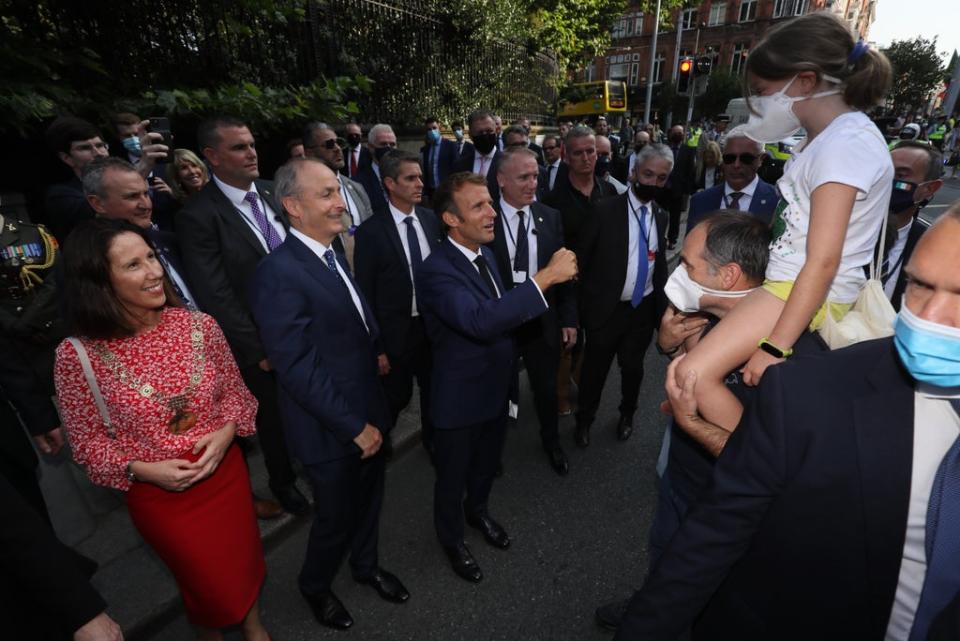 French President Emmanuel Macron with Taoiseach Micheal Martin meet the locals while on a walkabout in Dublin city centre, during his first official visit to Ireland (Brian Lawless/PA) (PA Wire)