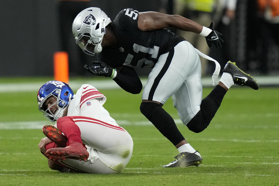 Las Vegas Raiders defensive end Malcolm Koonce (51) sacks New York Giants quarterback Daniel Jones during the first half of an NFL football game, Sunday, Nov. 5, 2023, in Las Vegas. (AP Photo/John Locher)