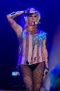 Two signature Ke$ha looks: Blue lips and a re-purposed American flag, at Rio Rocks in 2011.