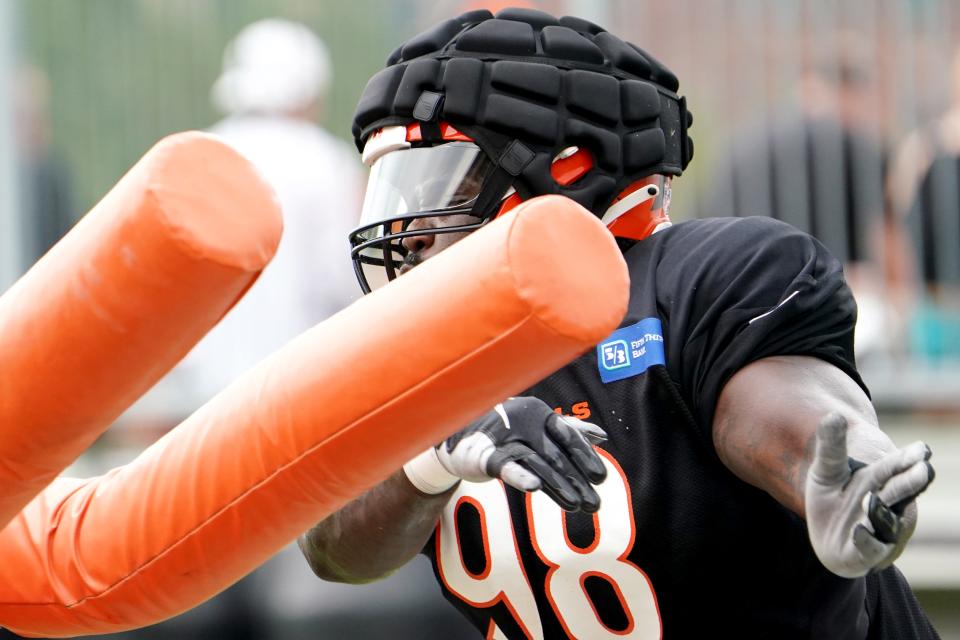 Cincinnati Bengals nose tackle D.J. Reader (98) participates in drills during Cincinnati Bengals training camp practice, Thursday, Aug. 4, 2022, at the Paul Brown Stadium practice fields in Cincinnati. 