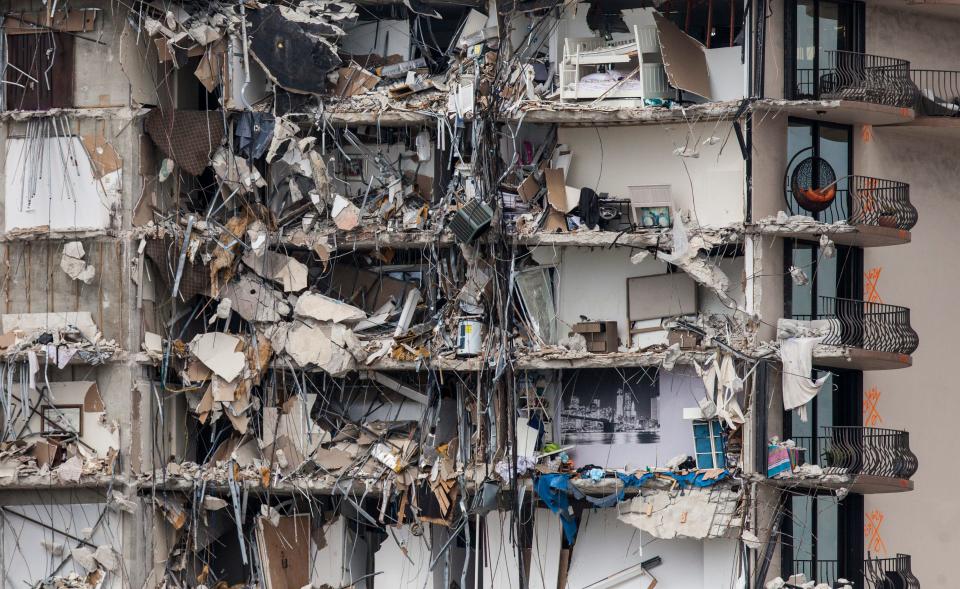 Rescuers continue to search through the rubble  of the Champlain Towers south condo collapse in Surfside, Florida on Tuesday, June 29, 2021.