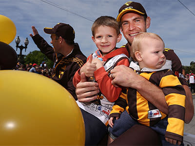 Luke Hodge of the Hawks poses with his kids during the 2013 AFL Grand Final Parade on September 27, 2013 in Melbourne, Australia. Photo: GETTY