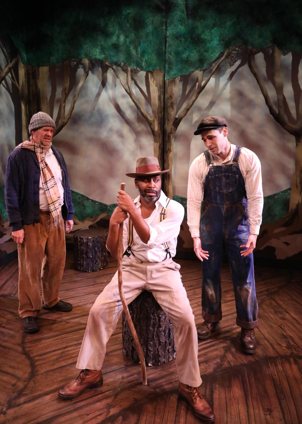 Steven H. Butler, center, in the 2022 Hippodrome State Theatre production of “As You Like It” by William Shakespeare, with Clinton Thornton, left, and Christian Carlson.