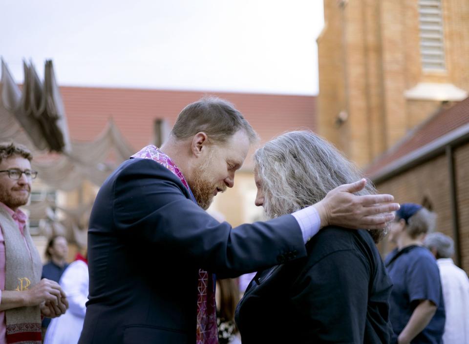 Interim Senior Pastor Ian White Maher of First Unitarian Church gives Tiffany Jacobs a blessing during the Utah Pride Interfaith Coalition Interfaith Service at the First Baptist Church in Salt Lake City on Wednesday, May 31, 2023. | Laura Seitz, Deseret News