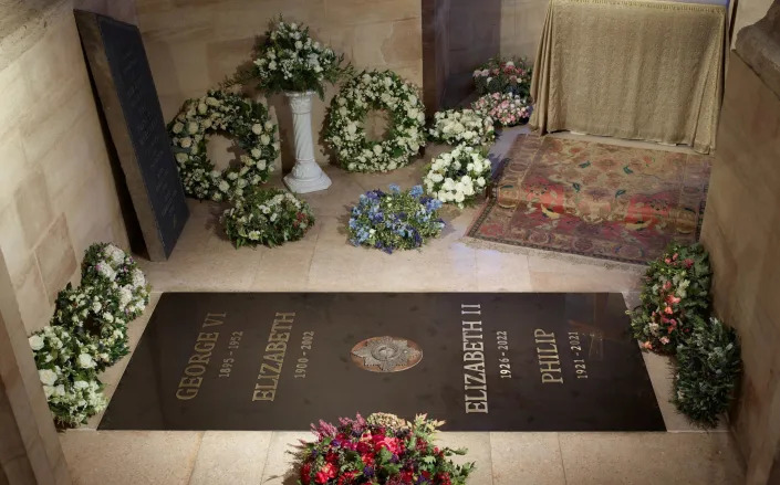 Newly released photograph shows the ledger stone installed in the King George VI Memorial Chapel in St George's Chapel where the monarch was buried on Monday - Royal Collection Trust/The Dean and Canons of Windsor 