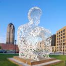 <p>The <a href="http://www.desmoinesartcenter.org/visit/pappajohn-sculpture-park" rel="nofollow noopener" target="_blank" data-ylk="slk:John and Mary Pappajohn Sculpture Park;elm:context_link;itc:0;sec:content-canvas" class="link ">John and Mary Pappajohn Sculpture Park</a> in Des Moines consists of 28 unique and enormous sculptures — a 27-foot hollow human form made of white steel letters is one you can admire from the inside and outside — spread across four acres of velvety grass. </p>