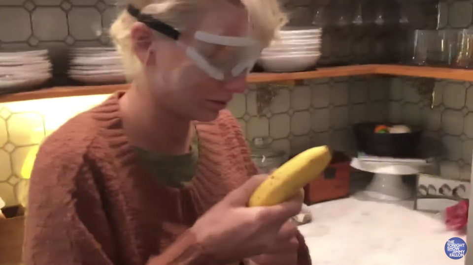 A photo of Taylor Swift wearing plastic glasses and holding a banana after LASIK surgery.