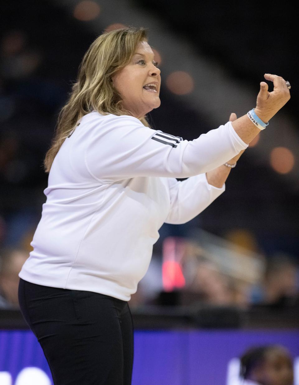 Trojans head coach Chanda Rigby instructs her players during the Troy vs Louisiana basketball game in the quarterfinals of the Sun Belt Conference Women's Basketball Championship at the Pensacola Bay Center on Friday, March 8, 2024. Prior to Troy, Rigby coached at Pensacola State College for seven years.