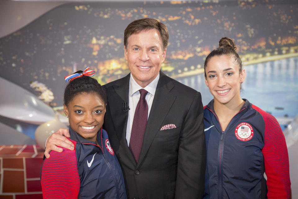 NBC's Bob Costas poses with U.S. gymnasts Simone Biles and Aly Raisman on Aug. 17 at the Summer Olympics. Media coverage of the games was frequently criticized for gender bias. (Photo: NBC via Getty Images)