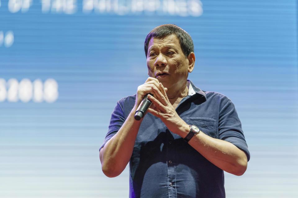 Philippine President Rodrigo Duterte speaks to members of the Philippine community during a gathering in Singapore. (Photo: Getty Images)