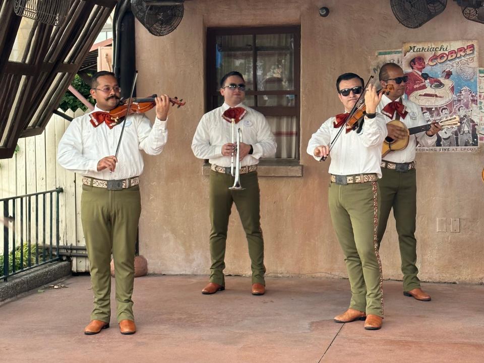 mariachi band playing in mexico pavilion at epcot in disney world