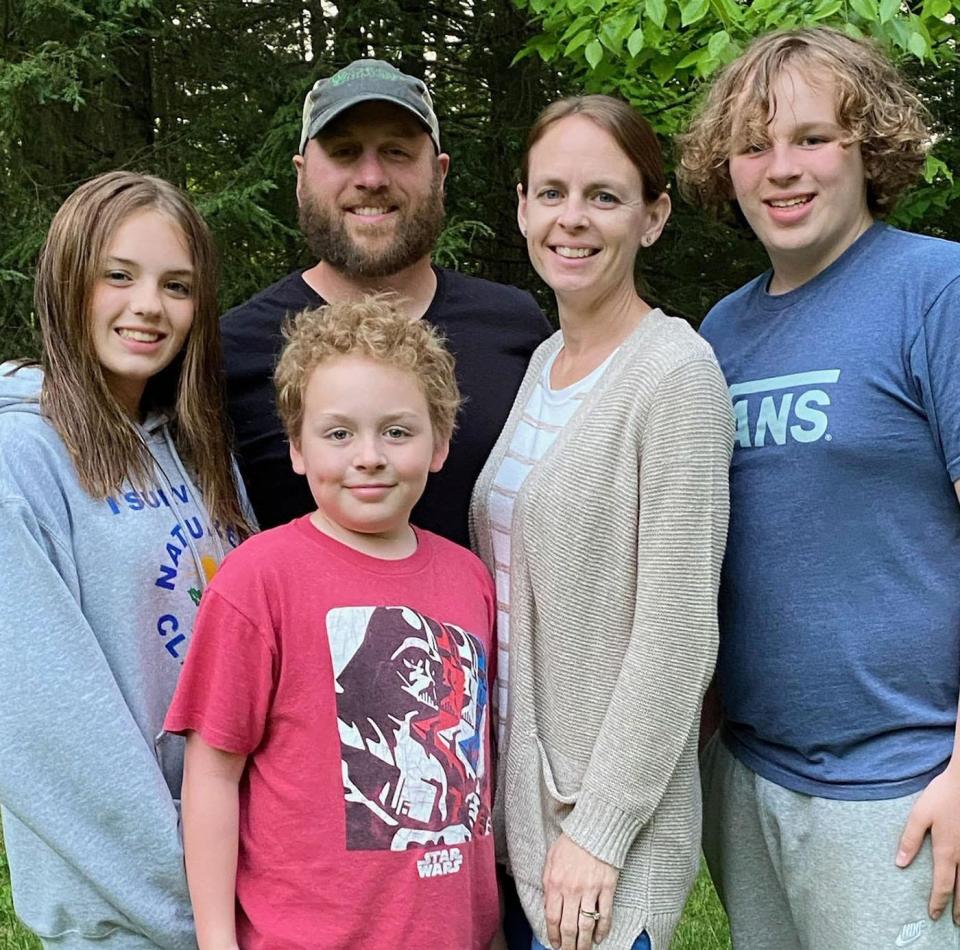Former Oakmont star softball pitcher Kalene (Wotton) Brown is pictured with her family, from left daughter Nora, son Kellen, husband Jeremy and son Desmond.