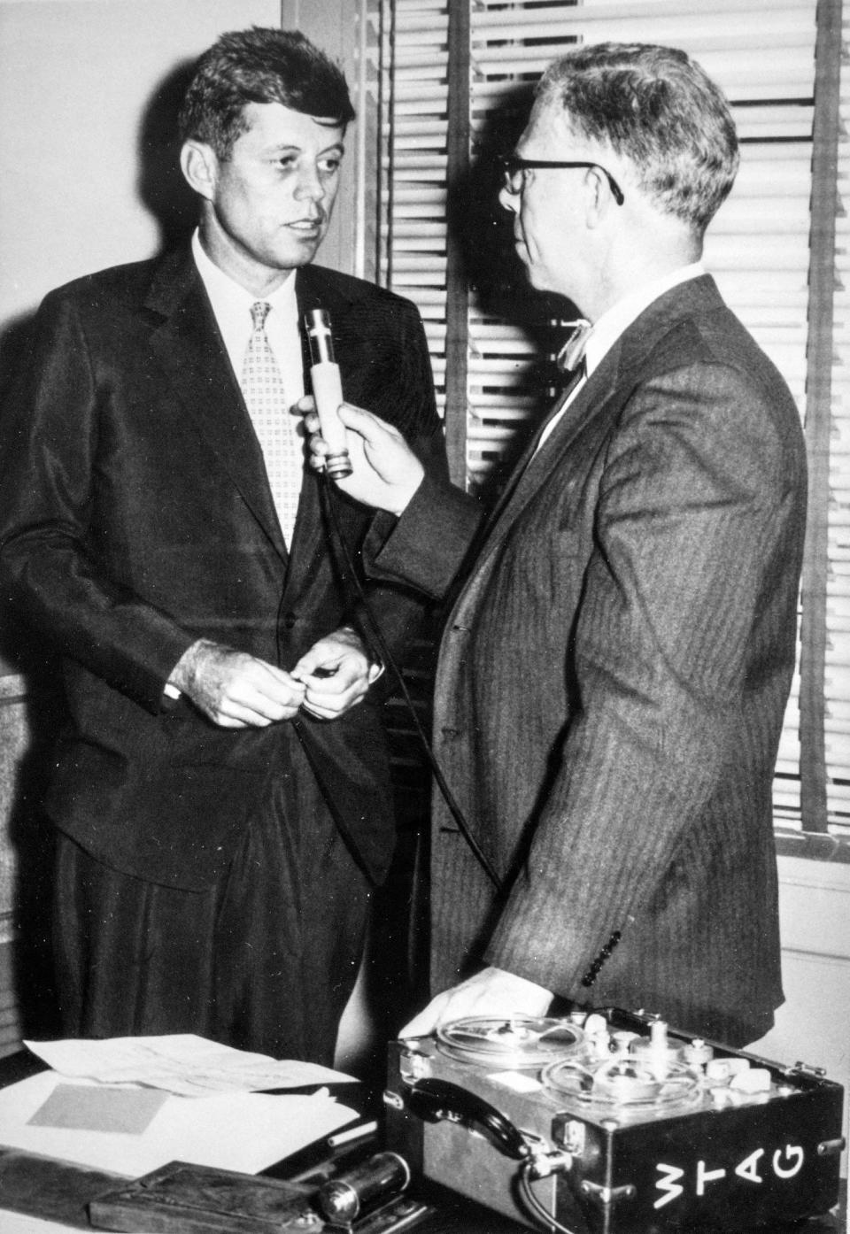 Sen. John F. Kennedy is interviewed by a WTAG reporter.
