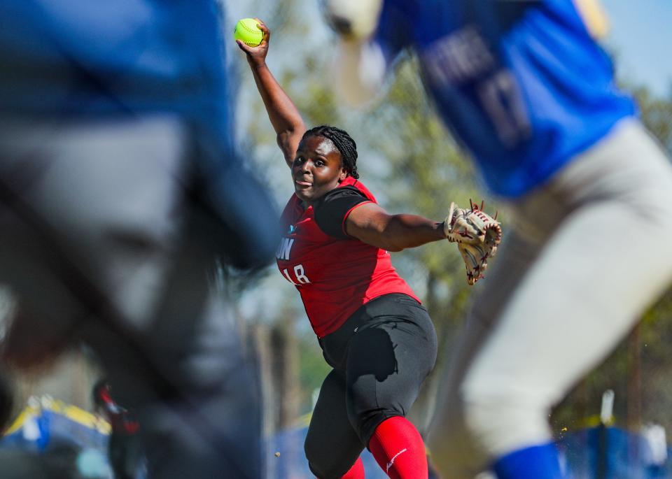 Milton's Alona Lynch pitches during a game against Braintree on Monday, May 9, 2022.