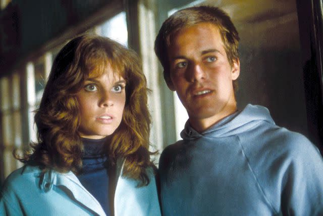 <p>Columbia/Kobal/Shutterstock</p> Alexandra Paul and John Stockwell in 1983's 'Christine'