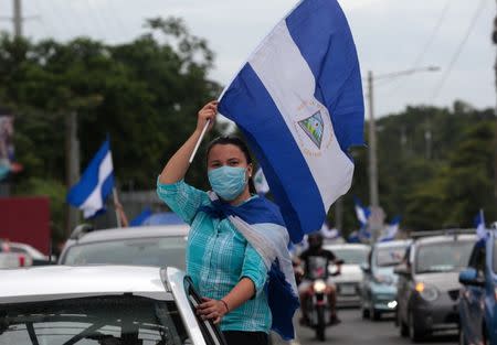 An anti-government protester takes part in a caravan of car and motorcycles to demand an end to violence in Ticuantepe, Nicaragua July 15, 2018.REUTERS/Oswaldo Rivas