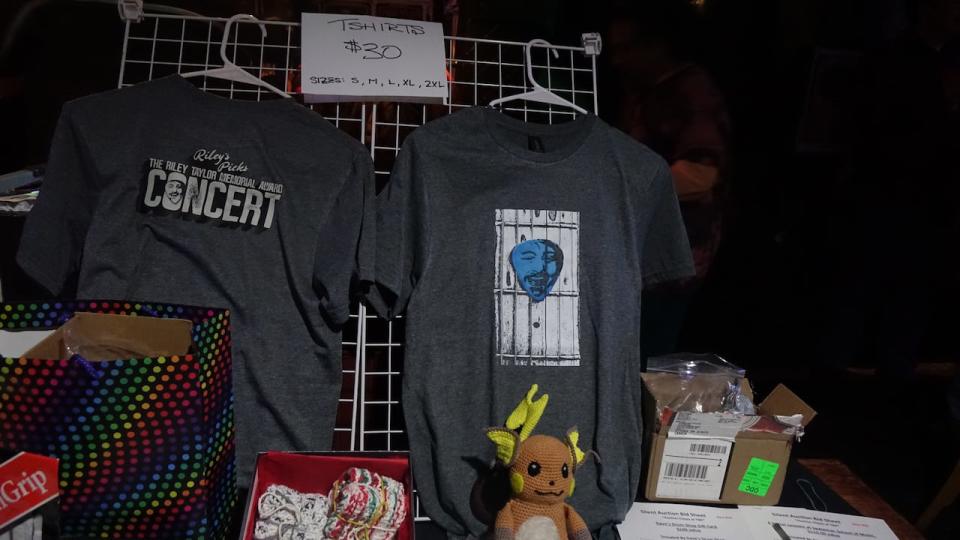 T-shirts featuring a pick with Riley Taylor's face on it were sold at a silent auction at the venue along with items donated by local businesses to help support the scholarship. 