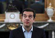 Greek Prime Minister Alexis Tsipras looks on during a swearing in ceremony of members of his government at the Presidential Palace in Athens, Greece July 18, 2015. REUTERS/Alkis Konstantinidis