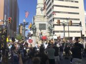 Protester gather in Allentown, Pa., on Monday, July 13, 2020, to express outrage and press their demand for accountability after video emerged of an officer placing his knee on a man's head and neck area outside a hospital. Police have launched an internal probe. (AP Photo/Michael Rubinkam)