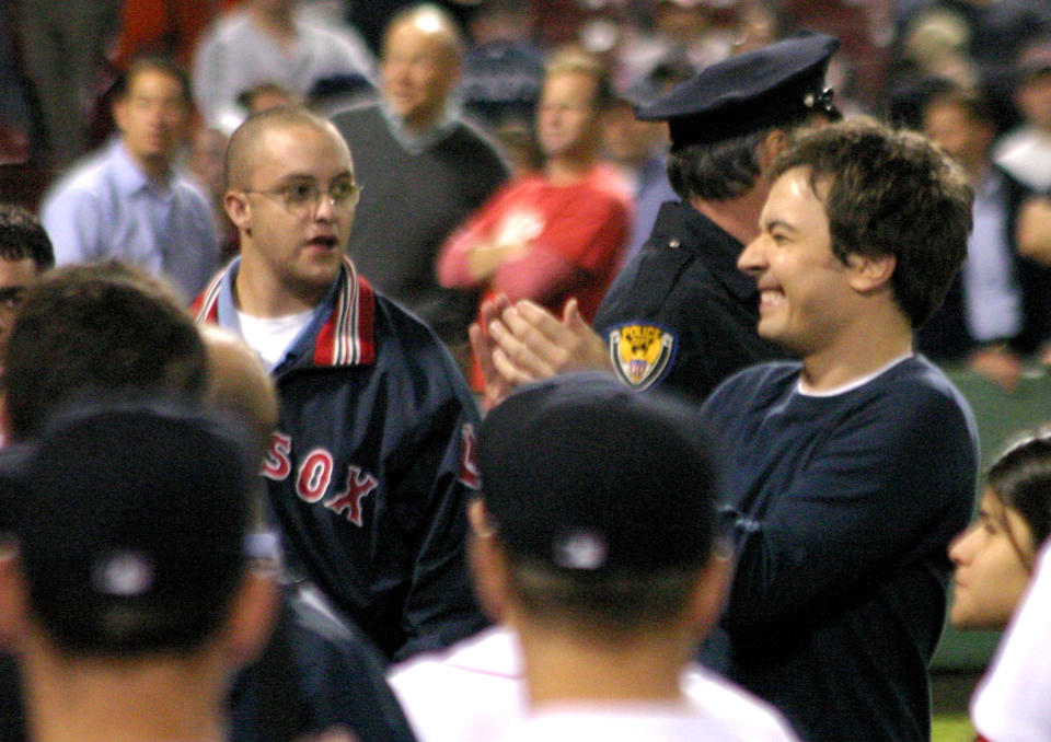 Actor Jimmy Fallon waves to the crowd after filming a scene from "Fever Pitch" the Farrelly Brother's new film, after the Red Sox game at Fenway Park in Boston, Massachusetts (Photo by Marc Andrew Deley/FilmMagic)