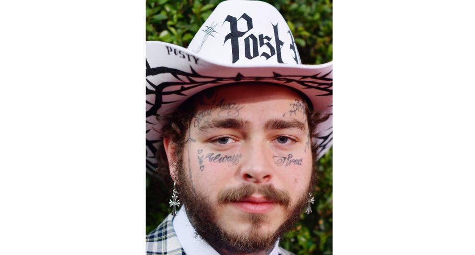  Post Malone's "Always Tired" and "Stay Away" face tattoos. (Getty Images)