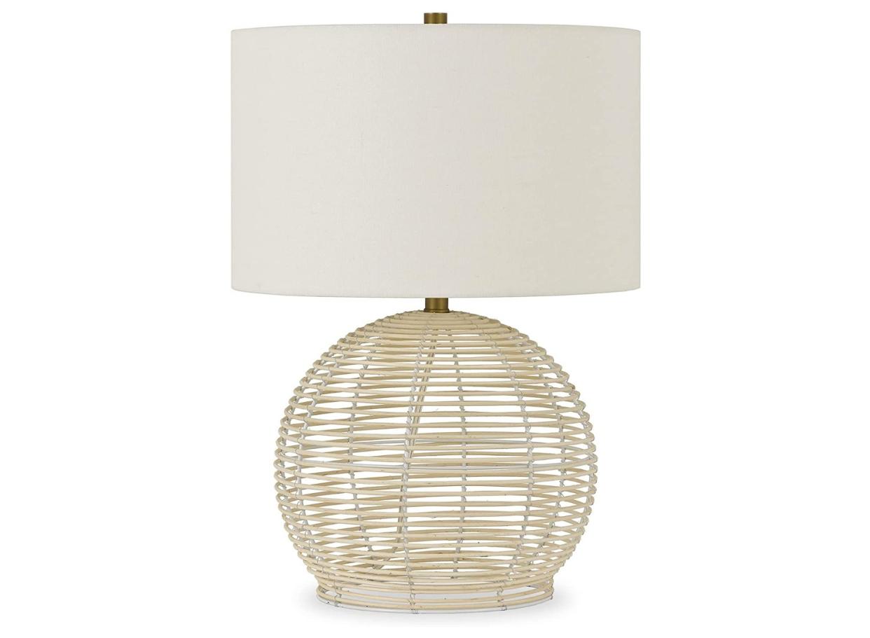 Create the coastal look with this unique rattan wood lamp. (Source: Amazon)