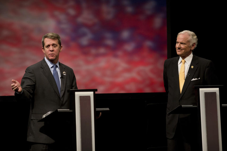Democratic state Rep. James Smith and Republican Gov. Henry McMaster meet in the South Carolina governor debate, Wednesday, Oct. 17, 2018 at Francis Marion University Performing Arts Center in Florence, S.C. (Andrew J. Whitaker/The Post And Courier via AP)