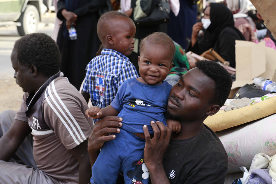 Migrants protest, Saturday, Oct. 9, 2021, in front of the office of the United Nation’s humanitarian body in Tripoli, Libya. The demonstration comes after U.N. officials said on the same day that guards at a Libyan detention center for migrants shot and killed at least six people amid chaos in the overcrowded facility. (AP Photo/Yousef Murad)