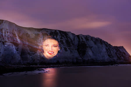 A projection wishing singer and war time sweetheart Vera Lynn a happy birthday is projected on to the cliffs at Dover, Britain, March 17, 2017. Picture take March 17, 2017 Decca Records handout via REUTERS