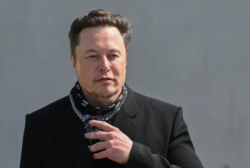 Elon Musk, Tesla CEO, stands at a press event on the site of the Tesla Gigafactory. Musk, the owner of social media platform X and luxury electric carmaker Tesla who at times has been accused of backing anti-Semitic posts, visited the memorial site of the former German concentration camp Auschwitz on Monday. Patrick Pleul/dpa Pool/dpa