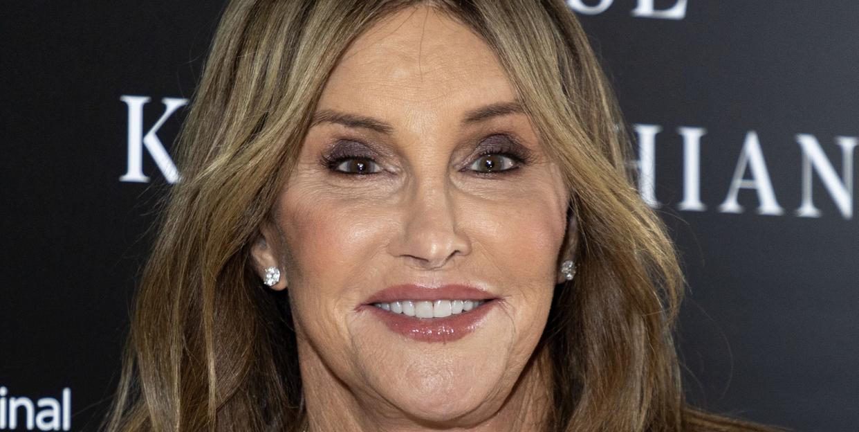 caitlyn jenner smiling in a white dress