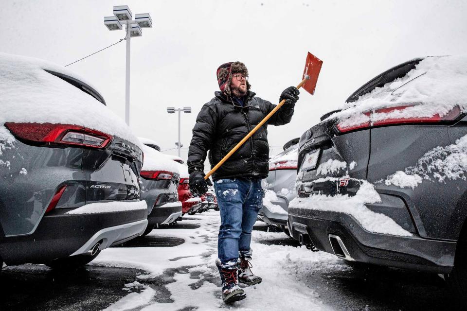 Tim Sheridan, General Manager, spends the morning removing snow from the cars at his Kirkwood Highway Sheridan Ford dealership after a snowstorm dropped close to 3 inches since yesterday in Wilmington, Tuesday, Jan. 16, 2023.