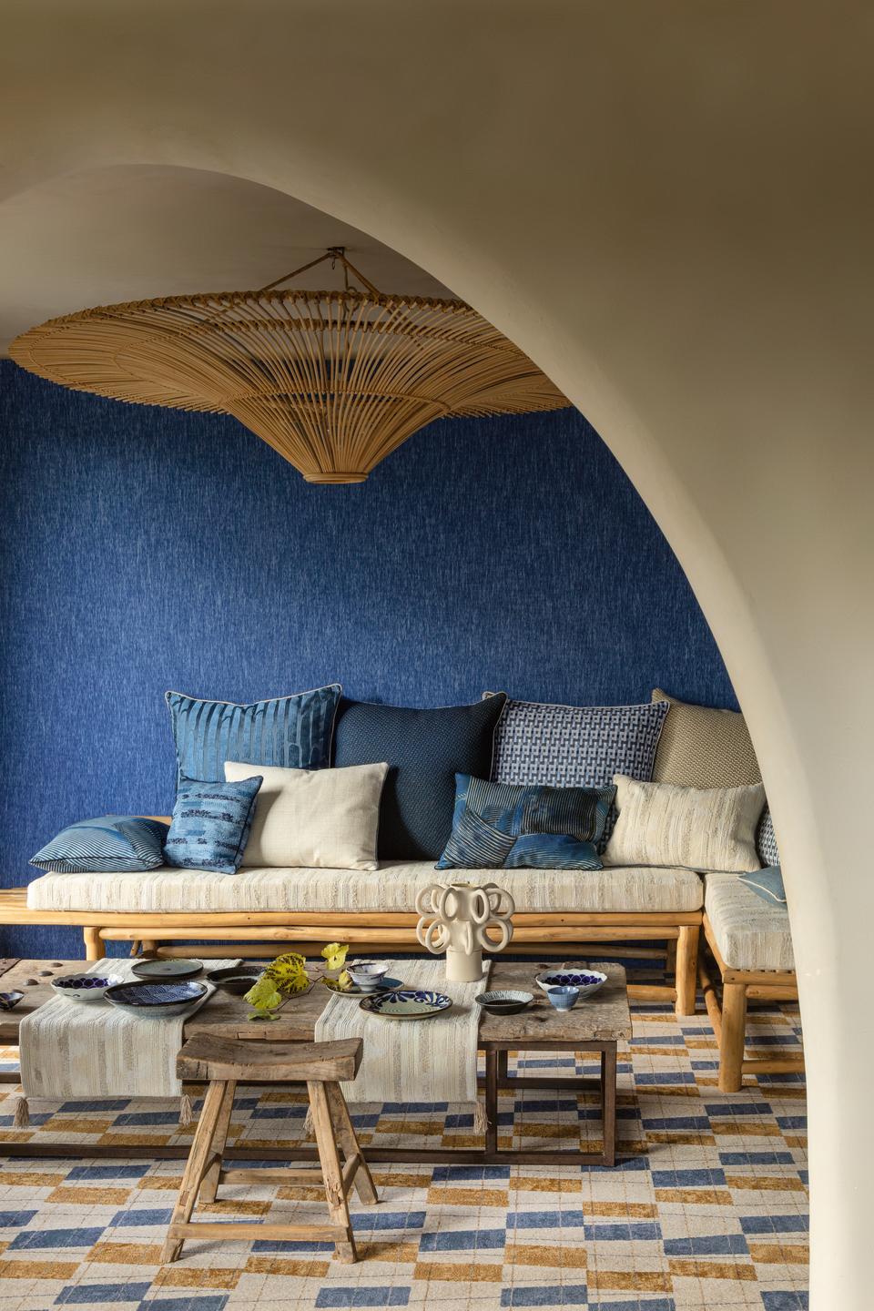 A bright blue natural fabric on the walls