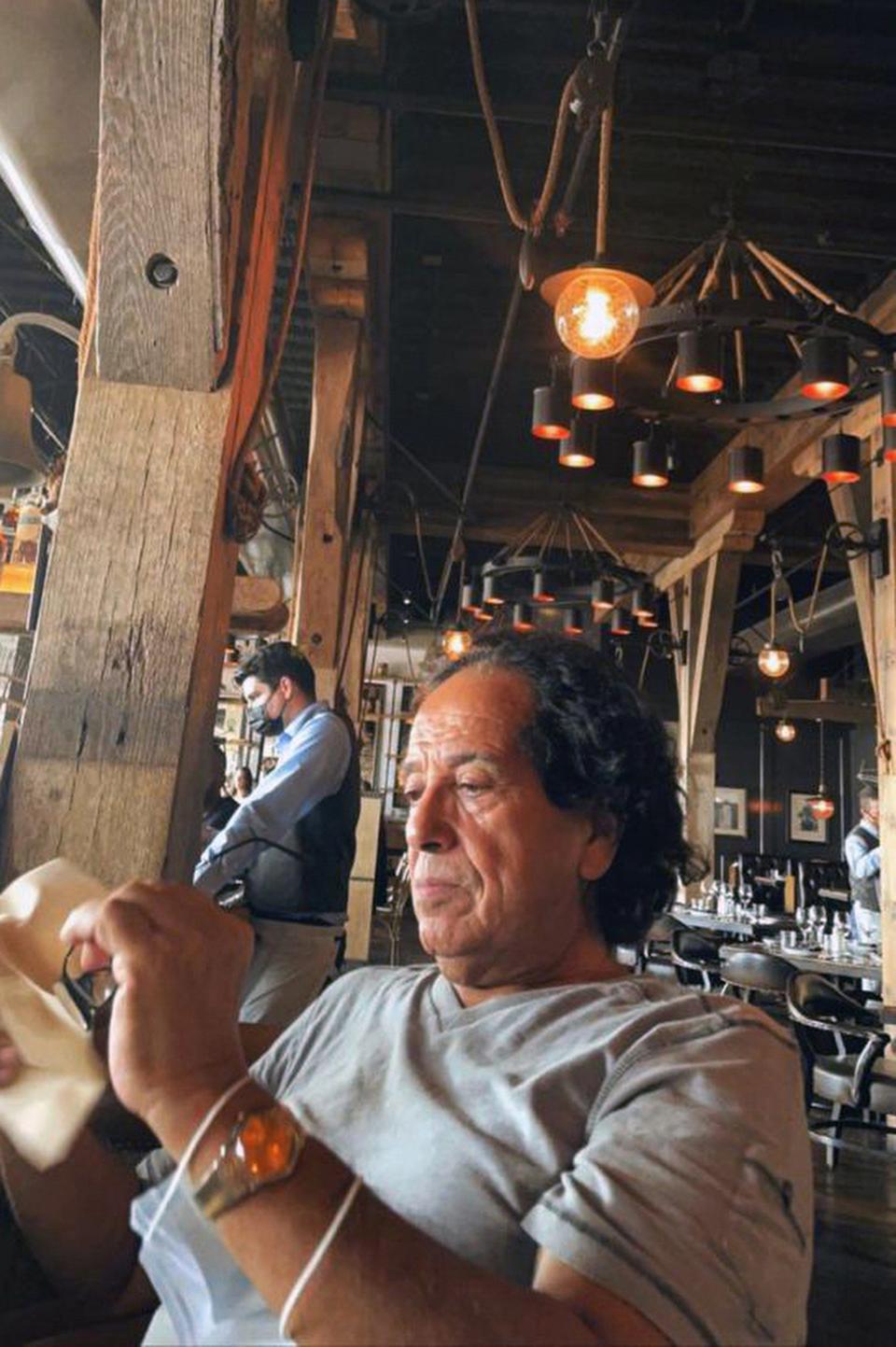 In this photo provided by Ibrahim Almadi, Saad Ibrahim Almadi sits in a restaurant in an unidentified place in the United States in August 2021. Almadi, 72, who is a citizen of both Saudi Arabia and the U.S., was arrested in Saudi Arabia last November and was recently sentenced to 16 years in prison over tweets critical of the Saudi government. (Ibrahim Almadi via AP)