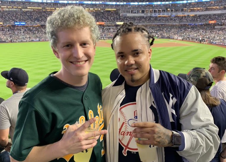 The A’s fan who had beer tossed on him at the wild-card game attended ALDS Game 4 with the Yankees fan who tossed the beer on him. (@johnnyplaydrums)