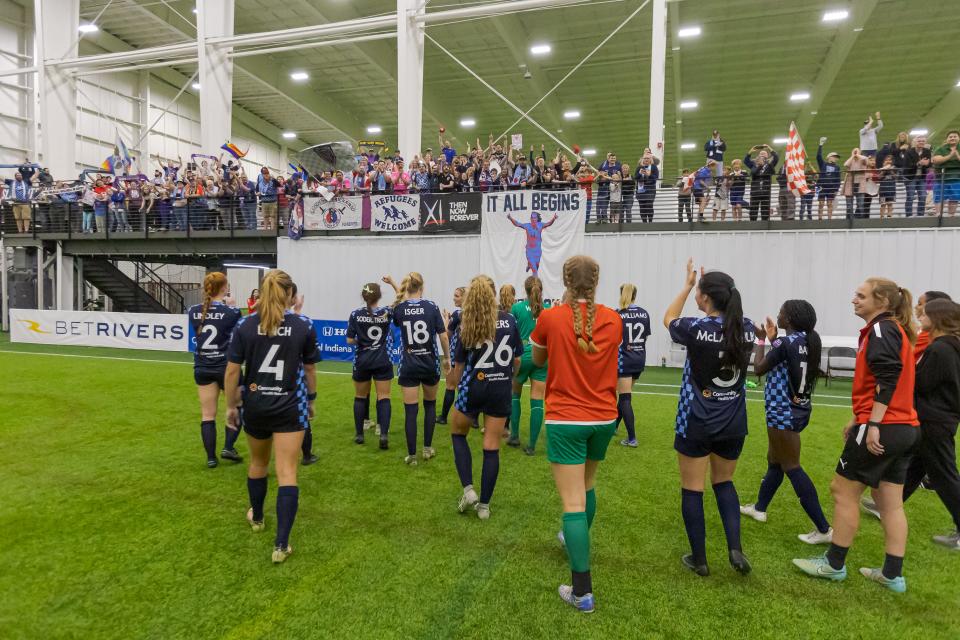 Indy Eleven celebrates with fans following a 3-1 victory over Kings Hammer FC in the inaugural USL W League game.