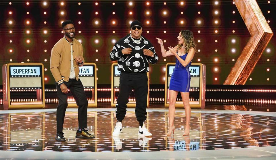 <p>Sonja Flemming/CBS</p> Nate Burleson, LL Cool J and Keltie Knight