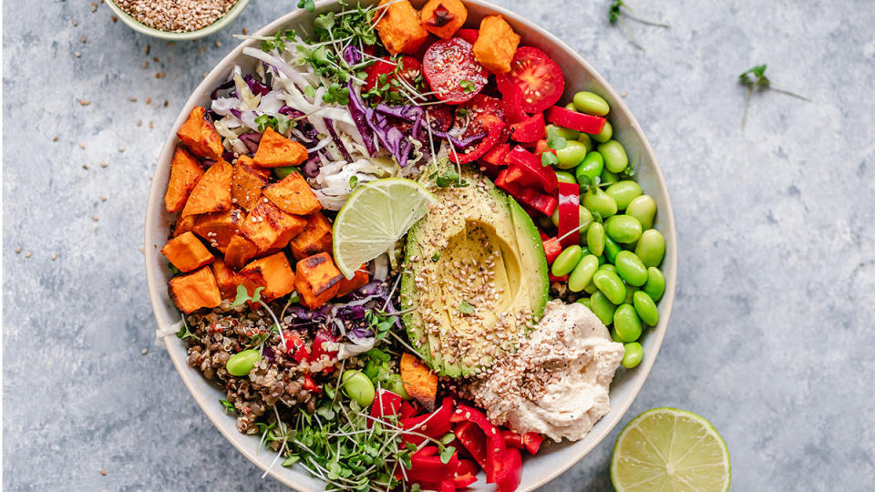 A bowl full of healthy fruits and vegetables that help lower uric acid level to speed off the weight