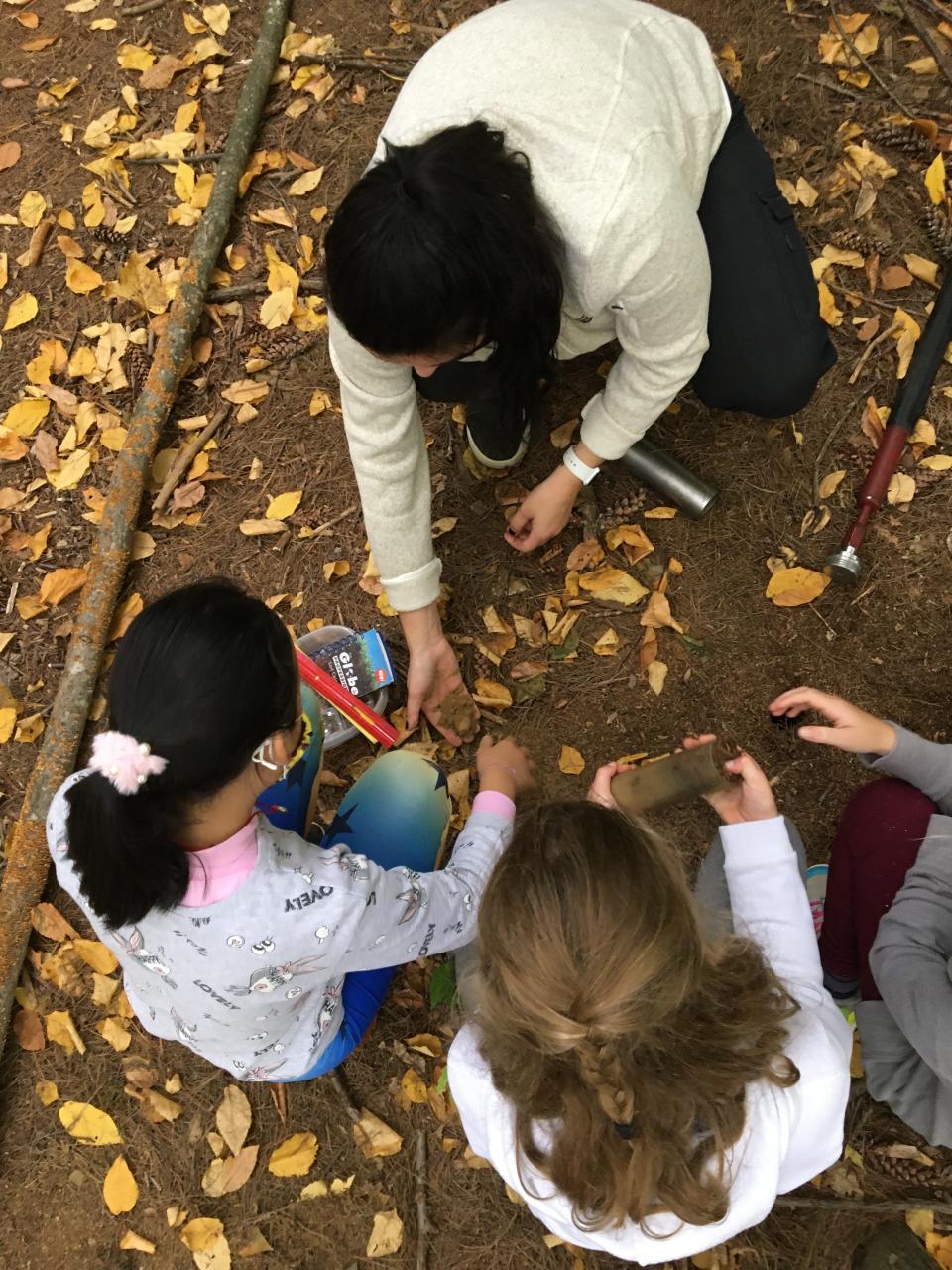 Students from Moharimet Elementary School and Mast Way Elementary School used rulers, magnifying glasses, soil color books, a microscope, and were even able to try out augers, shovels and soil corers to dig their own soil samples.