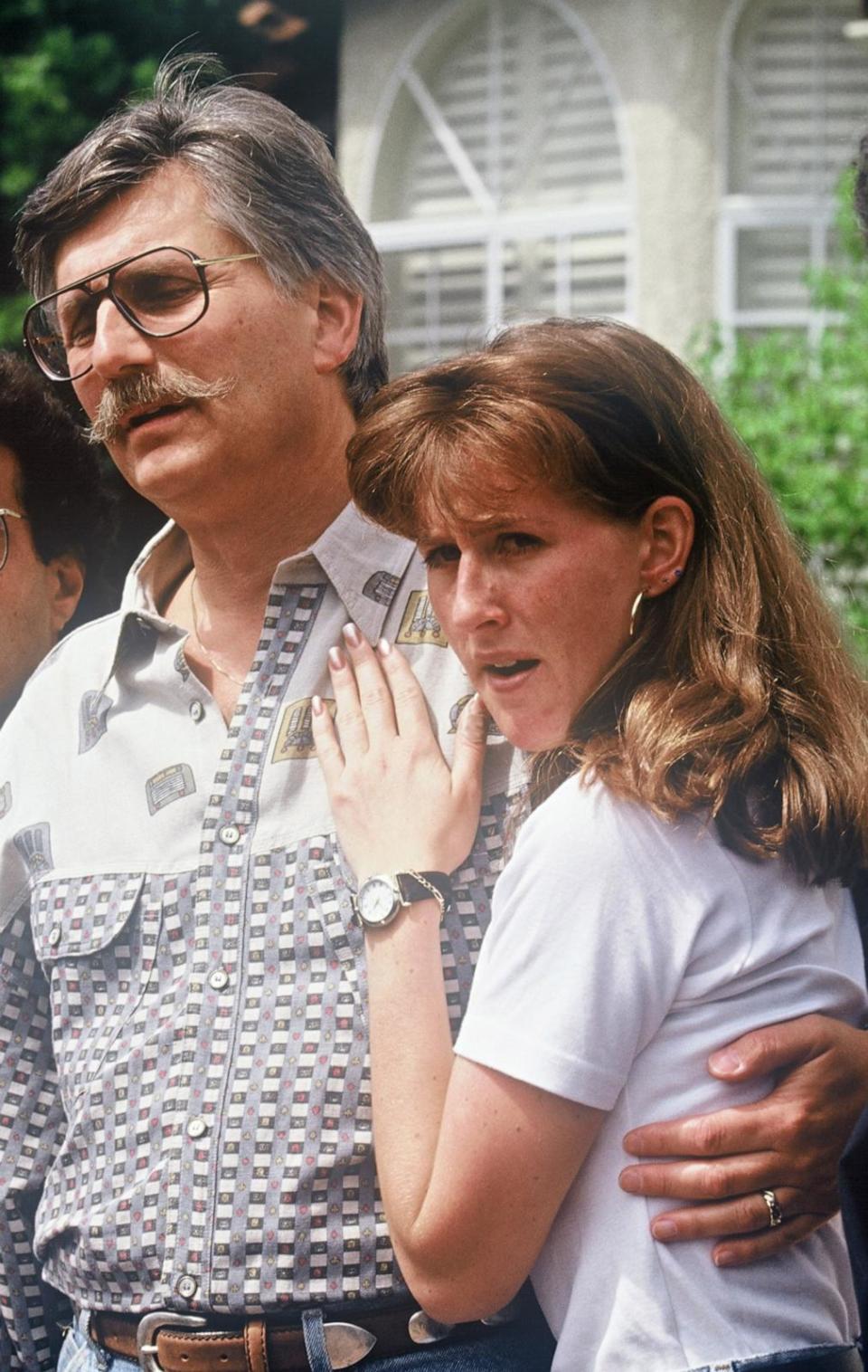 PHOTO: Fred and Kim Goldman, father and sister of Ronald Goldman, appear in front of the media June 15, 1994 at their home in Agoura Hills, CA, following the murder of Ronald and O.J. Simpson's ex-wife Nicole Brown Simpson. (Lee Celano/WireImage)