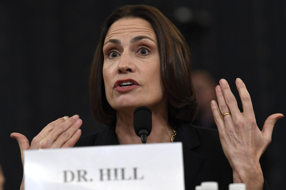 Former White House national security aide Fiona Hill, talks about the time her mother gave her a bowl haircut when she was a child as she testifies before the House Intelligence Committee on Capitol Hill in Washington, Thursday, Nov. 21, 2019, during a public impeachment hearing of President Donald Trump's efforts to tie U.S. aid for Ukraine to investigations of his political opponents.(AP Photo/Susan Walsh)