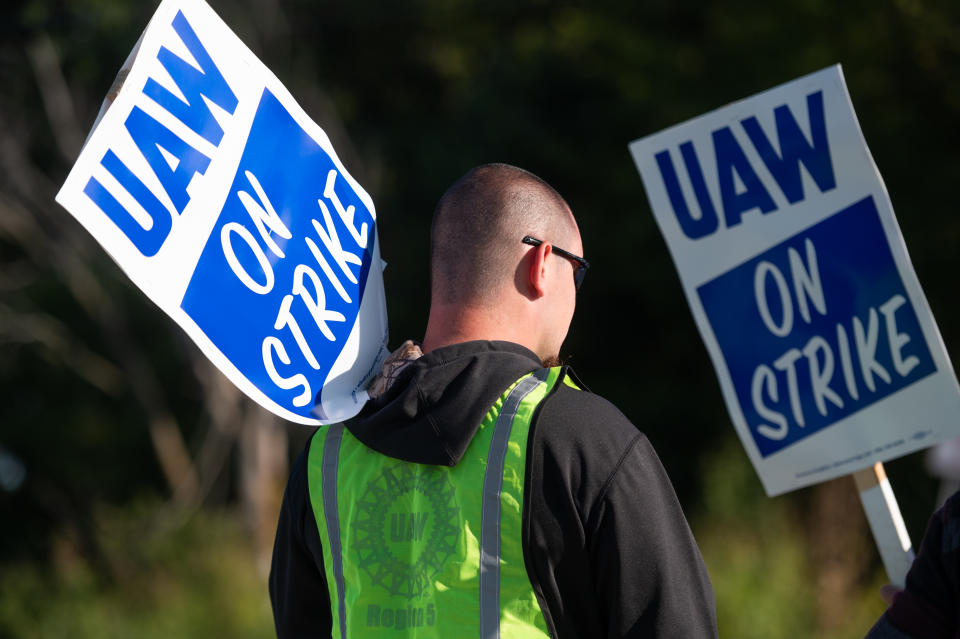GM workers with the UAW Local 2250 Union strike outside the General Motors Wentzville Assembly Plant.