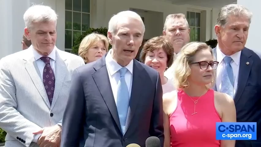 President Biden and a bipartisan group of senators speak to reporters after they reached agreement on infrastructure legislation.