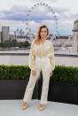 <p>For the London photocall, Margot chose a sophisticated cream outfit</p>