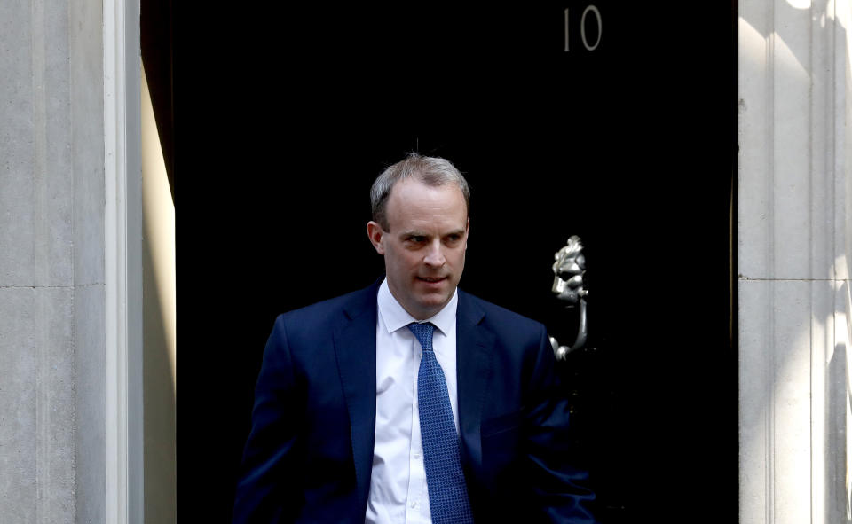 Britain's Foreign Secretary Dominic Raab leaves 10 Downing Street, London, Wednesday April 22, 2020. Dominic Raab will stand in for Prime Minister Boris Johnson at the weekly Prime Minister’s Questions session, who is still recovering from a bout of COVID-19. (AP Photo/Frank Augstein)