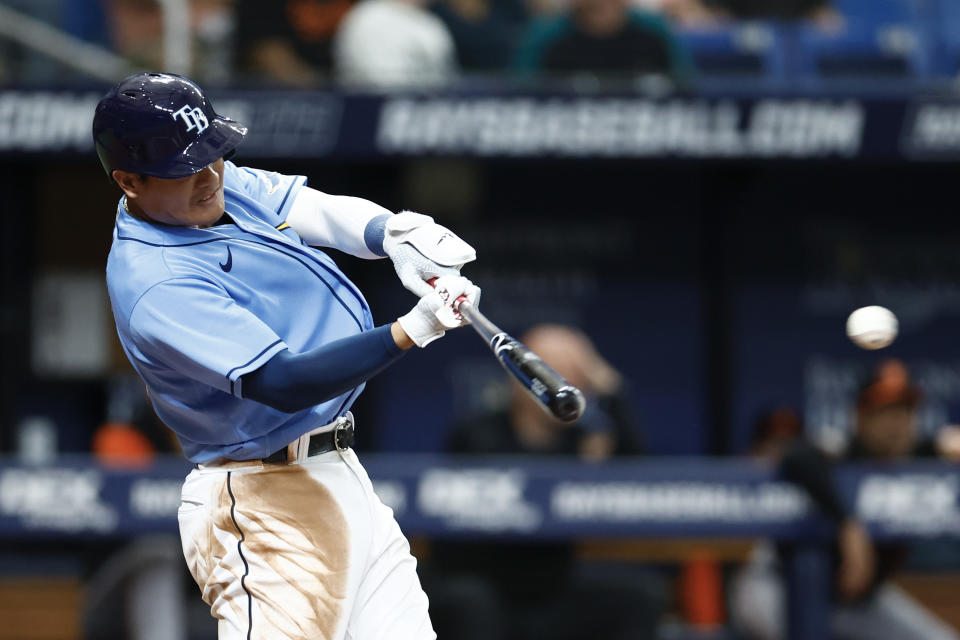 ST PETERSBURG, FLORIDA - AUGUST 13: Yu Chang #9 of the Tampa Bay Rays hits a RBI single during the sixth inning against the Baltimore Orioles at Tropicana Field on August 13, 2022 in St Petersburg, Florida. (Photo by Douglas P. DeFelice/Getty Images)