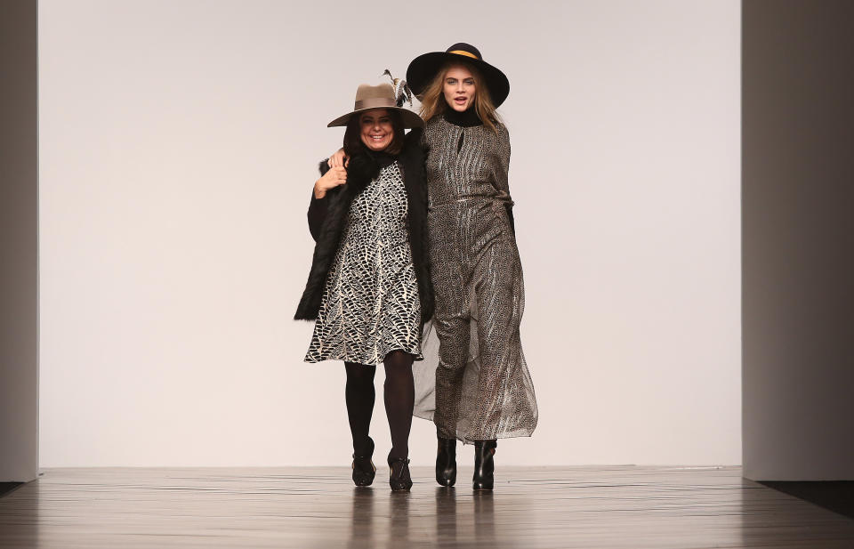 British model Cara Delevingne, right and Brazilian designer Daniella Helayel take the applause after the show by Issa during London Fashion Week, at Somerset House in central London, Saturday, Feb. 16, 2013. (Photo by Joel Ryan/Invision/AP)