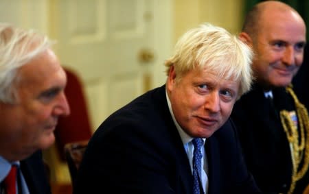 British PM Johnson attends a roundtable at Downing Street in London