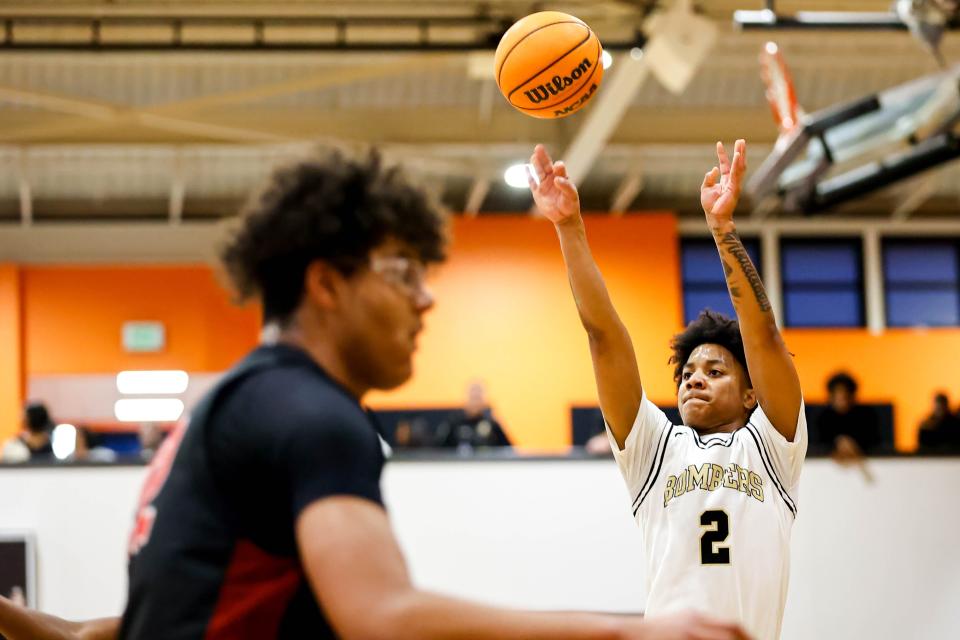 Midwest City’s Roy Henderson (2) shoots the ball during a Putnam City Invitational Boys Basketball game between Union and Midwest City in Oklahoma City, on Friday, Jan. 5, 2024.